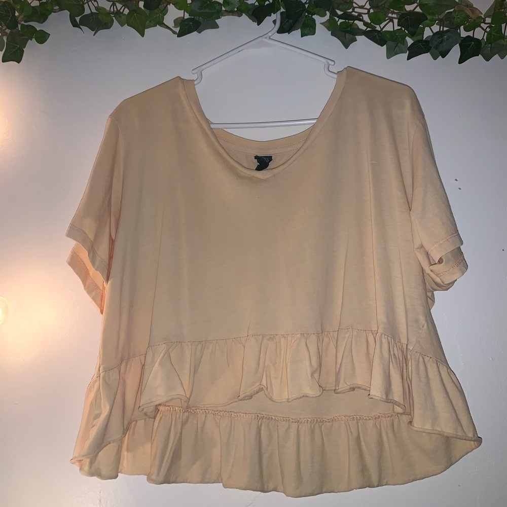 Flowy pastel orange V-neck blouse